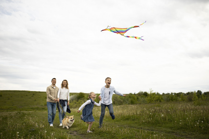 full-shot-happy-family-flying-kite-109-240